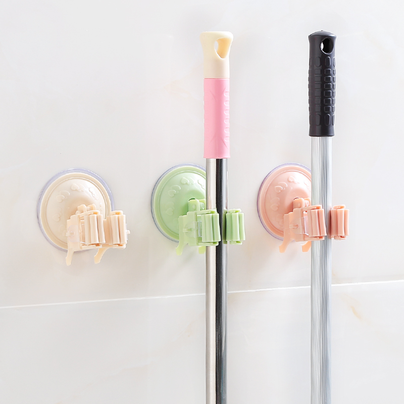 Door behind the wall hanging mop hanger broom hook Strong vacuum suction cup without trace nail-free mop holder card hol